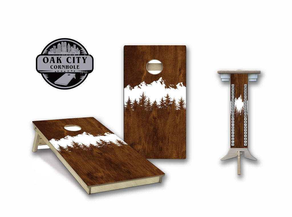 Custom regulation cornhole boards with a mountain camping design.