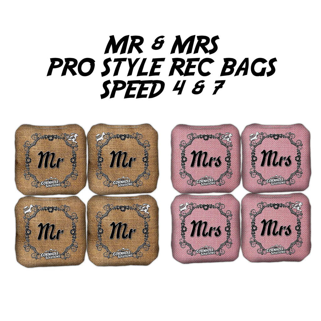 Set of Mr. & Mrs. Pro Style Rec Cornhole Bags from Oak City Cornhole, featuring dual speed sides for versatile play. High-quality construction with elegant Mr. & Mrs. designs, perfect for weddings, anniversaries, or couples' game nights. Durable, weather-resistant bags for consistent performance.