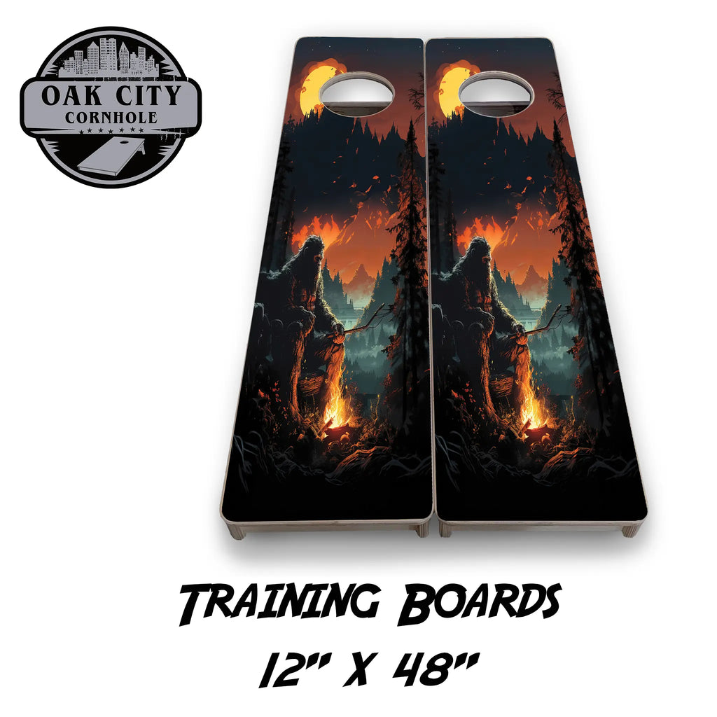 Premium handcrafted 24x48 cornhole boards with a 'Dusk in Bigfoot Country' design from Oak City Cornhole, featuring a detailed evening forest scene with Bigfoot, perfect for tournaments and casual play.