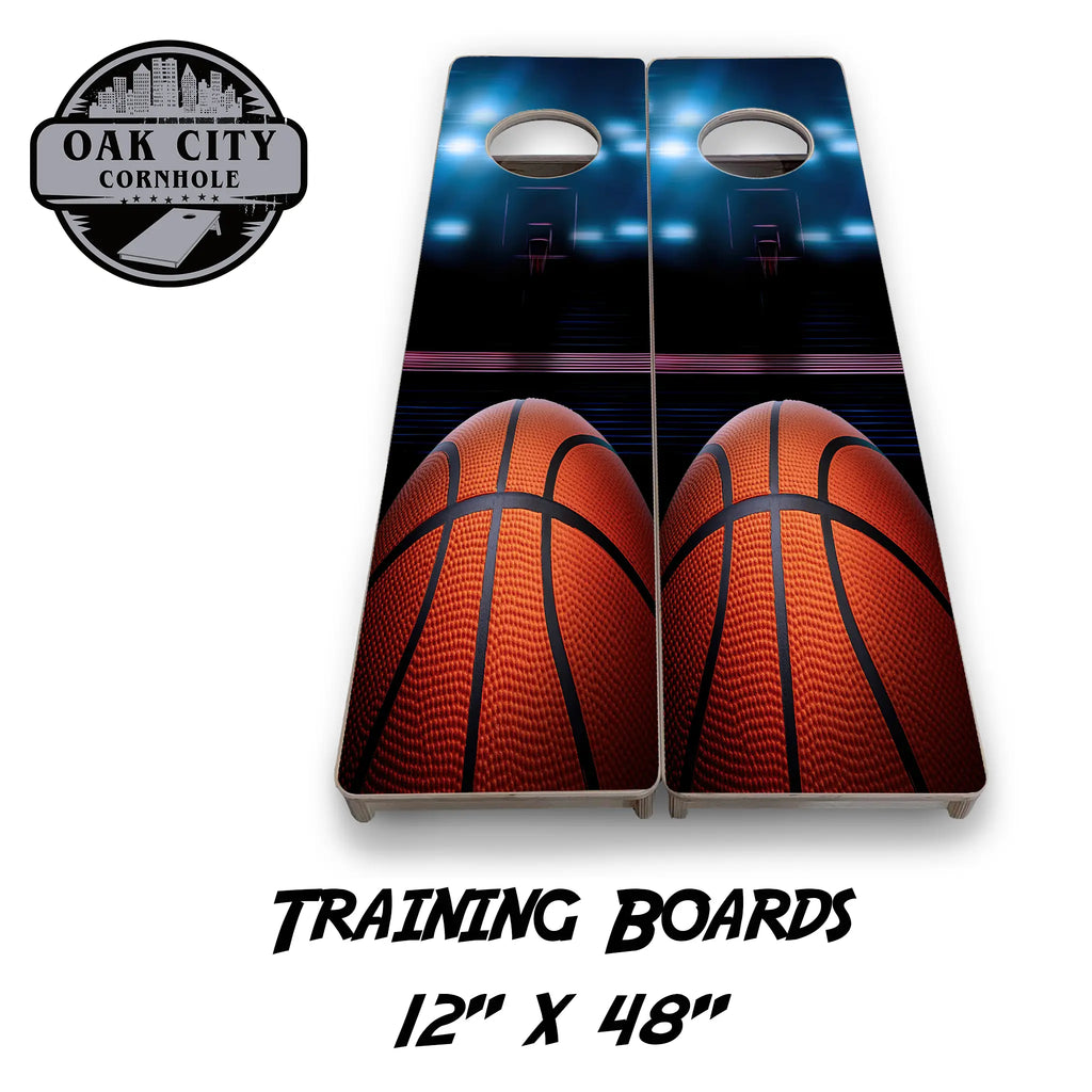 High-quality cornhole boards featuring a dynamic basketball slam dunk design, perfect for tournaments and backyard fun.