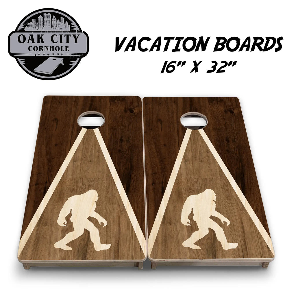 Bigfoot Adventure Cornhole Boards by Oak City Cornhole featuring a striking silhouette of Bigfoot on a beautifully crafted wood design. Premium handcrafted 24"x48" regulation boards made from high-quality Baltic birch plywood, perfect for cornhole enthusiasts and serious players.