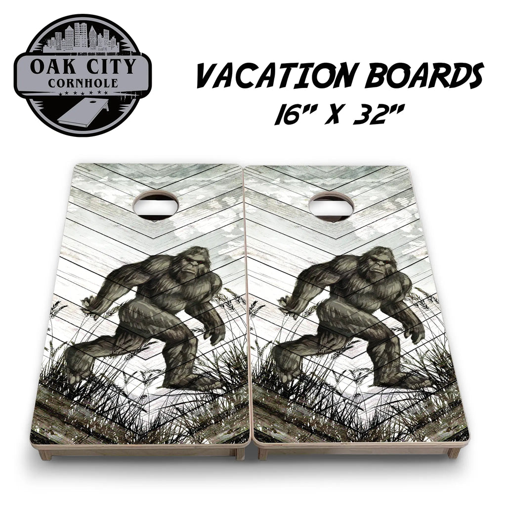 Bigfoot Encounter Cornhole Boards by Oak City Cornhole featuring a dramatic depiction of Bigfoot against a rustic, weathered wood backdrop. Premium handcrafted 24"x48" regulation boards made from high-quality Baltic birch plywood, perfect for competitive gameplay and outdoor gatherings.