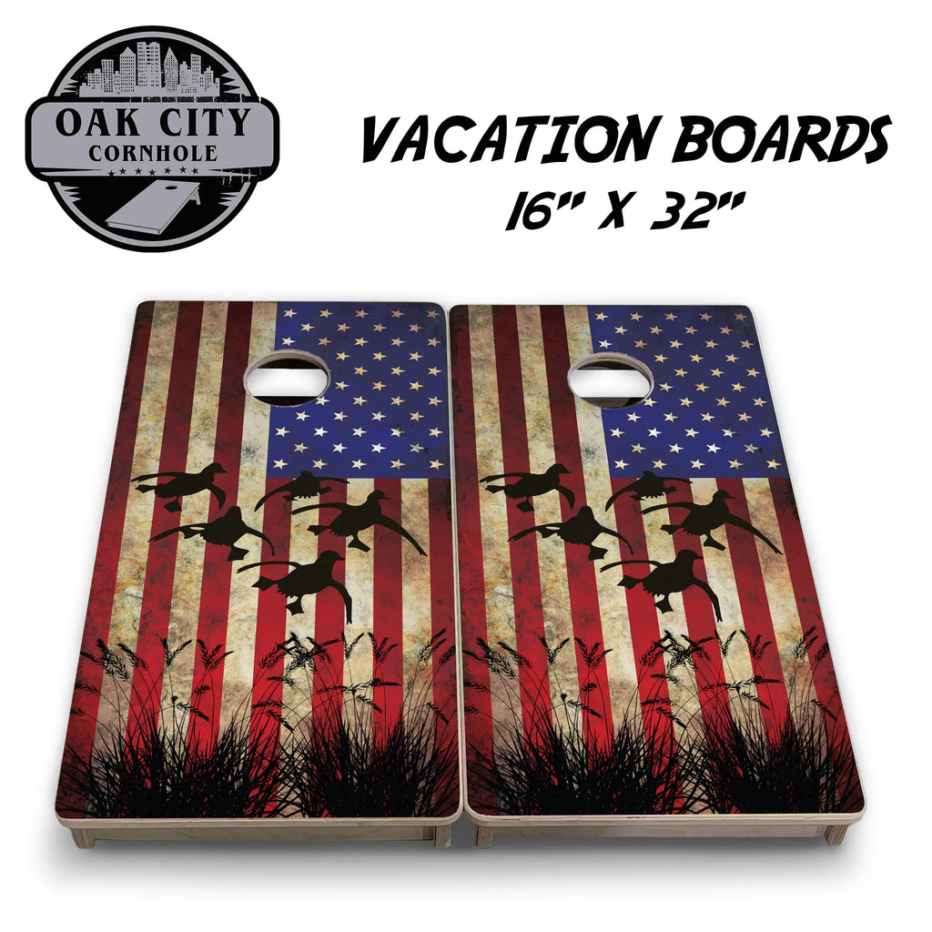 Patriotic Duck Hunter Cornhole Boards – Tournament Design - Premium Handcrafted 24x48 Set from Oak City Cornhole, featuring a vibrant duck hunting scene with American flag accents.